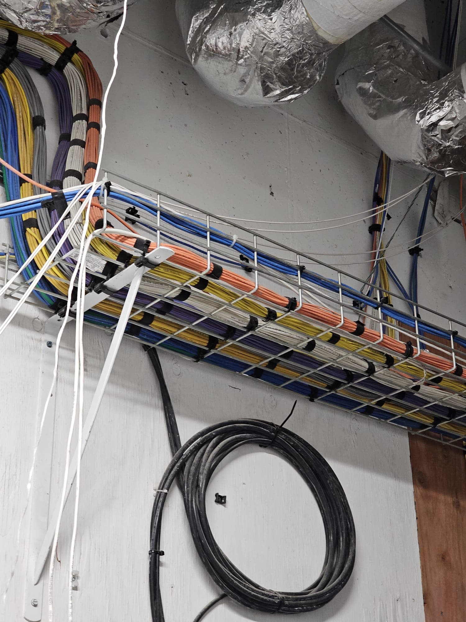 Overhead cable tray with color-coded network cables